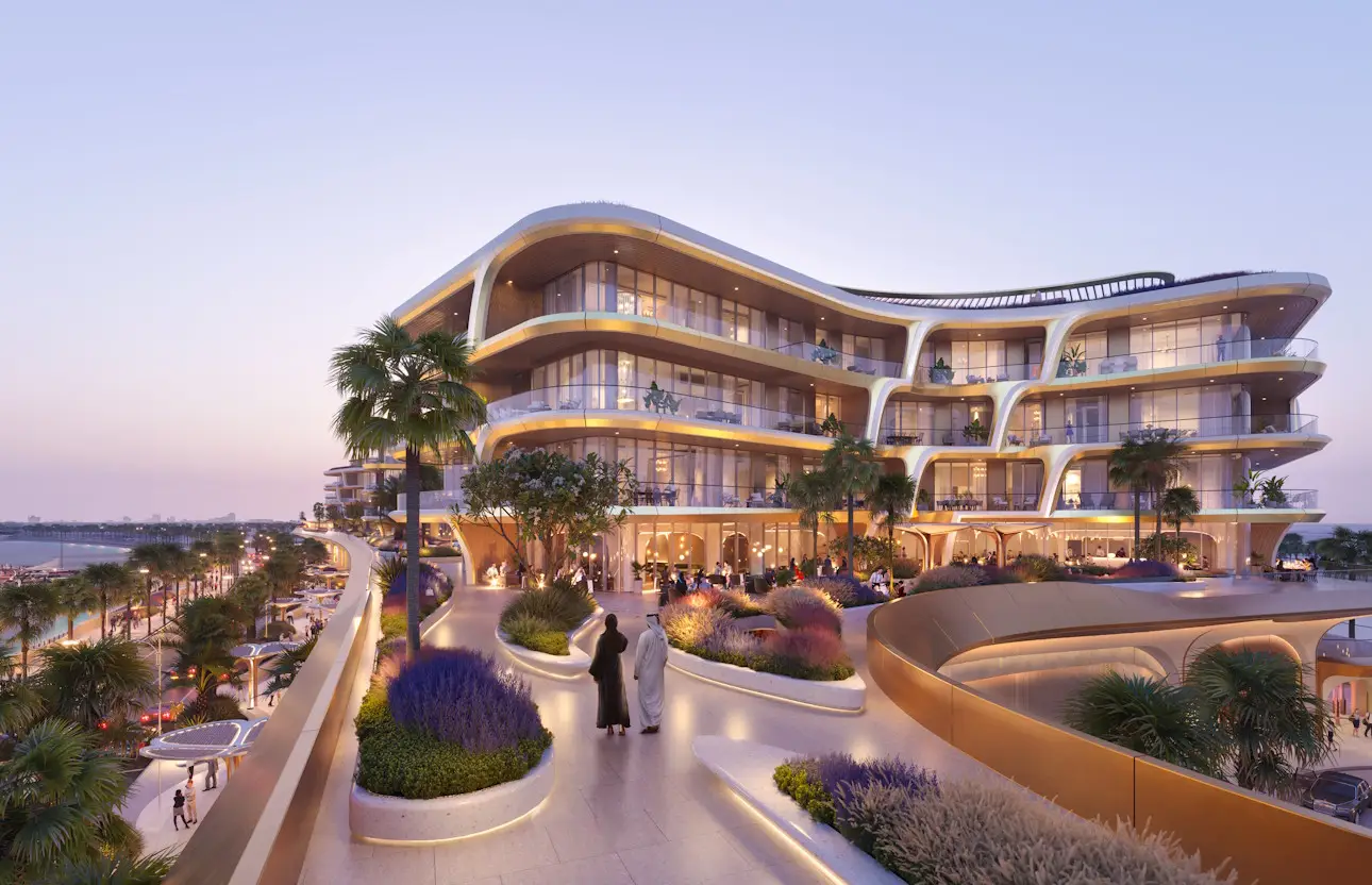 The Grove Architectural rendering of a multi-story luxury hotel or residential building at dusk, featuring highly curved facades, warm interior lighting, and a prominent elevated promenade with contemporary landscaping and low-level lighting. Two figures in traditional attire are walking in the foreground.