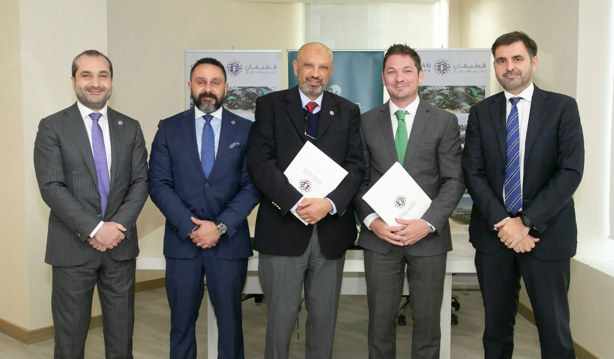 Signing ceremony between Qetaifan Projects and WhiteWater West for the manufacture and installation of waterpark rides at Qetaifan Island North